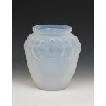 An Etling opalescent glass Bird of Paradise vase, moulded in low relief, cast Etling France to base,