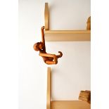 A teak and limba articulated monkey designed by Kaj Bojesen, designed 1951, and a collection of