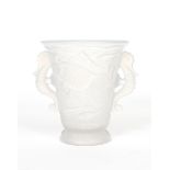 An opalescent glass vase probably Barolac, flaring, footed form cast in low relief with dish, with