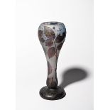 An Art Nouveau Daum Nancy cameo glass vase, swollen opaque glass cased in blue and purple, acid-