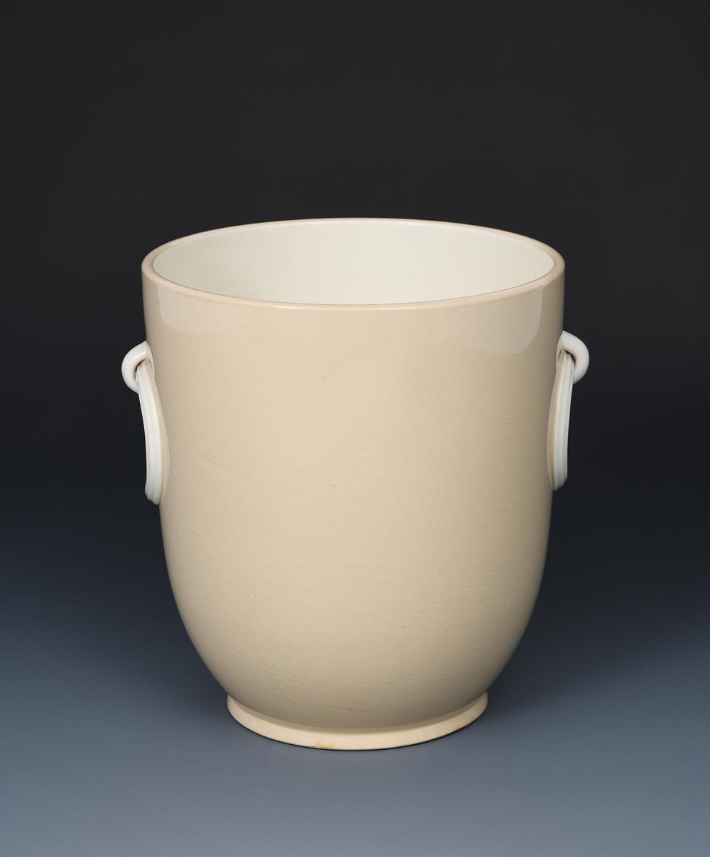 A rare Wedgwood vase designed by Keith Murray, flaring cylindrical form with cast loop handles,