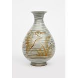 ‡ Charles Vyse (1882-1971) a porcelain bottle vase dated 1939, pear shaped with everted top rim,