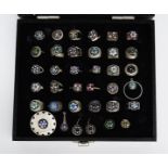 A collection of Strathearn glass mounted jewellery, comprising twenty-nine rings, five pairs of cuff