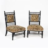 A pair of Aesthetic Movement ebonised wood bedside chairs, with turned bobbin back and front rail,