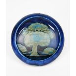 'Moonlit Blue' a Moorcroft Pottery dish designed by William Moorcroft, circular with inverted top