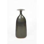 Joanna Constantinidis (1927-2000) a tall stoneware vase, tapering elliptical form with flaring top