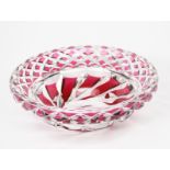 A Val St Lambert cut glass bowl, flaring form with cut geometric decoration and red flashing to