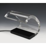 An Oluce Acrylica 271 desk lamp designed by Joe Colombo, model no.271, curved clear acrylic light on