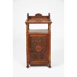 An oak pot cupboard dated 1897 the design attributed to Arthur Simpson of Kendal, rectangular form
