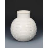 A Wedgwood Moonstone vase designed by Keith Murray, shape no.3801, ribbed ovoid form with collar