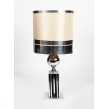 A Maison Janson style chrome table lamp, pierced square section plinth surmounted with chrome