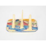 'Gibraltar' a Clarice Cliff Fantasque Bizarre two slice toast rack, painted in colours, printed