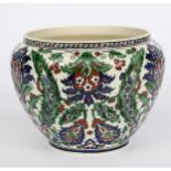 A Boch Freres Keramis Persian jardiniere, shouldered form, painted with panels of stylised foliage