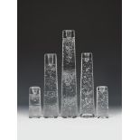 Five Iittala Arkipelago glass candlesticks designed by Timo Sarpaneva, tapering cylindrical clear