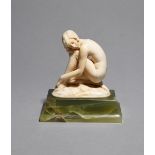 λ Ferdinand Preiss (1882-1943) Dreaming a carved ivory figure on flaring green onyx base, signed F