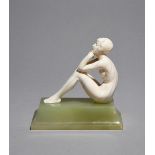 λ Ferdinand Preiss (1882-1943) Thoughts, an ivory figure, model no. 1131, on tapering green onyx
