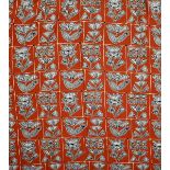 A pair of vintage printed linen curtains, printed in black with flower panels, on a red ground,