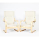 A pair of modern Artex birch 401 cantilever armchairs designed by Alvar Aalto, originally designed