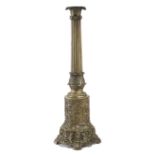 A FRENCH PRESSED BRASS TABLE LAMP LATE 19TH CENTURY with a bronzed finish and decorated in the