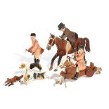 A CARVED AND PAINTED WOOD HUNTING GROUP IN THE MANNER OF NEW FOREST TOYS EARLY 20TH CENTURY with two