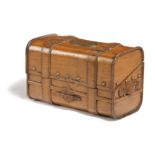 A FRENCH CARVED FRUITWOOD BOX IN THE FORM OF A TRUNK LATE 19TH CENTURY the hinged lid with a