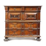 A CHARLES II OAK AND EXOTIC WOOD CHEST LATE 17TH CENTURY in two halves, with four long drawers