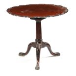 A MAHOGANY TRIPOD TABLE 18TH CENTURY AND LATER the circular tilt-top with a pie crust edge,