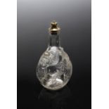 AN ITALIAN CARVED ROCK CRYSTAL FLASK IN RENAISSANCE STYLE 17TH / 18TH CENTURY with a silver gilt
