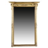 A WILLIAM IV GILTWOOD WALL MIRROR the rectangular plate within a reeded slip, the spiral ribbed