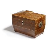 A REGENCY BURR YEW TEA CADDY EARLY 19TH CENTURY of sarcophagus shape, inlaid with boxwood