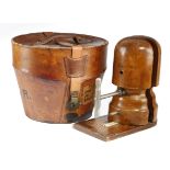 A BROWN LEATHER BUCKET SHAPE HAT BOX LATE 19TH / EARLY 20TH CENTURY with a padded silk lining and