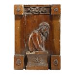 AN ITALIAN CARVED WALNUT RELIEF OF A SLAVE PROBABLY LATE 17TH / EARLY 18TH CENTURY the bearded