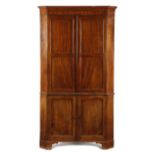 A GEORGE III MAHOGANY STANDING CORNER CUPBOARD LATE 18TH CENTURY in two halves, the top with a