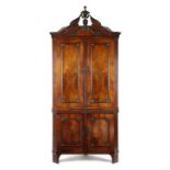 A DUTCH MAHOGANY STANDING CORNER CUPBOARD LATE 18TH CENTURY Neo-Classical decorated with egg and