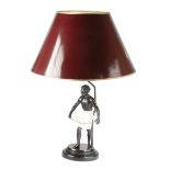 A PAINTED SPELTER BLACKAMOOR TABLE LAMP FIRST HALF 20TH CENTURY on an ebonised base, with shade (
