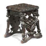 AN ITALIAN CARVED AND EBONISED WOOD STOOL VENETIAN, LATE 19TH CENTURY the faux cushion top above