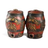 TWO POLYCHROME DECORATED STONEWARE SPIRIT BARRELS 19TH CENTURY the bodies with applied moulded