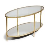 A GILT METAL OVAL COFFEE TABLE LATE 20TH CENTURY with a glass top and a mirrored base 50.3cm high,