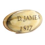 A REGENCY HORN OVAL SNUFF BOX PROBABLY WELSH, EARLY 19TH CENTURY the lid inscribed and dated 'D.