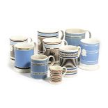 A SMALL COLLECTION OF POTTERY MUGS 19TH CENTURY comprising: three pearlware mocha ware examples