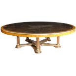 A LARGE MAHOGANY AND PARCEL GILT CENTRE TABLE PROBABLY MID-20TH CENTURY the circular top in two