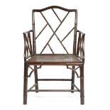 A FAUX BAMBOO COCKPEN STYLE OPEN ARMCHAIR LATE 19TH / EARLY 20TH CENTURY