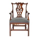 A MAHOGANY OPEN ARMCHAIR IN CHIPPENDALE STYLE 19TH CENTURY the pierced splat back carved with