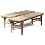 A PAIR OF CHINESE PINE BENCHES 19TH CENTURY with scroll decoration and turned stretchers (2) 56cm
