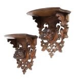A PAIR OF BLACK FOREST CARVED WOOD BULLDOG WALL BRACKETS LATE 19TH / EARLY 20TH CENTURY