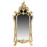 A FRENCH GILTWOOD WALL MIRROR IN LOUIS XV STYLE LATE 19TH / EARLY 20TH CENTURY the shaped central