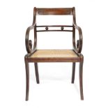 A REGENCY MAHOGANY ARMCHAIR IN THE MANNER OF GILLOWS EARLY 19TH CENTURY the curved top rail