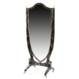 A BLACK JAPANNED AND PARCEL GILT CHEVAL MIRROR LATE 19TH / EARLY 20TH CENTURY the bevelled shield