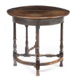 A QUEEN ANNE OAK GATELEG TABLE EARLY 18TH CENTURY the single drop-leaf top on baluster turned legs