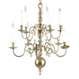 A DUTCH BRASS TEN-LIGHT CHANDELIER IN BAROQUE STYLE 20TH CENTURY the baluster turned body issuing